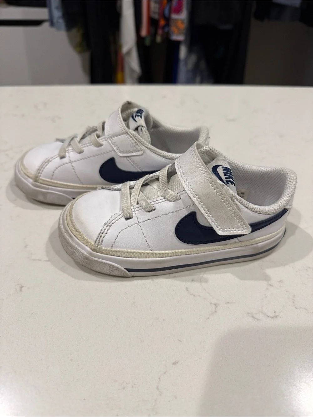 Nike Kids White Sneakers with Navy Swoosh and Velcro Strap